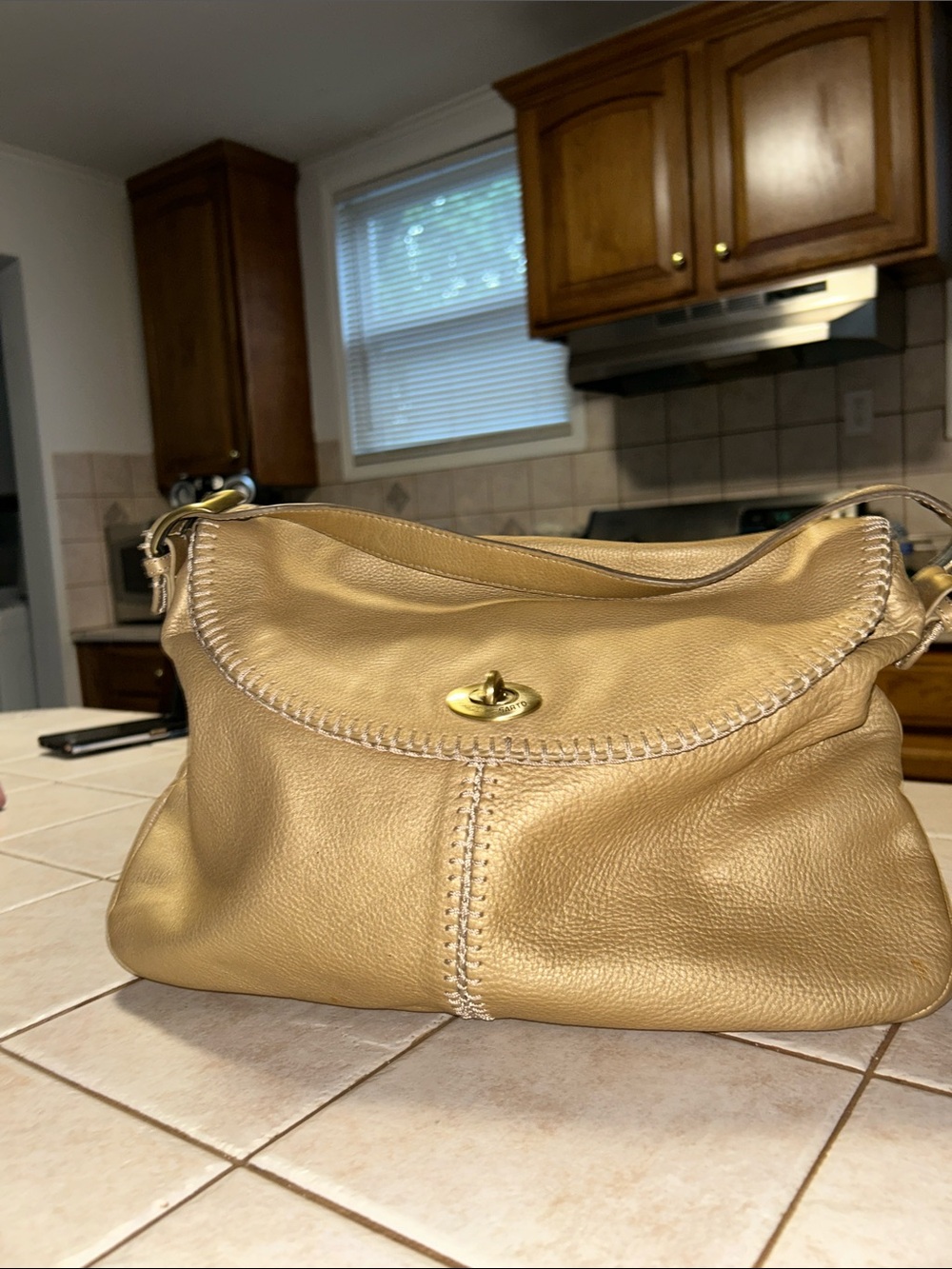 Franco Sarto Gold Leather Shoulder Bag with Gold Turn-Lock